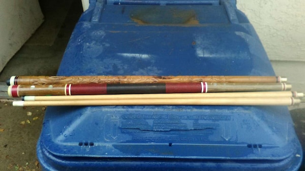 antique pool cues with ivory